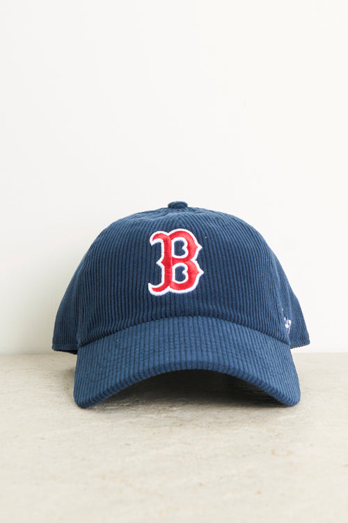 Blue men's hat with red contrasting logo