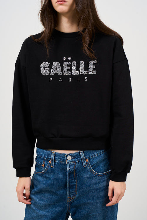 Women's black sweatshirt with silver details