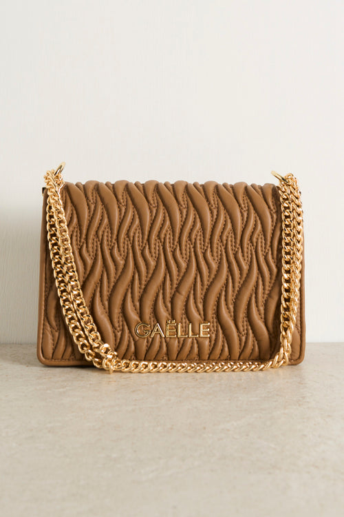 Beige quilted women's bag