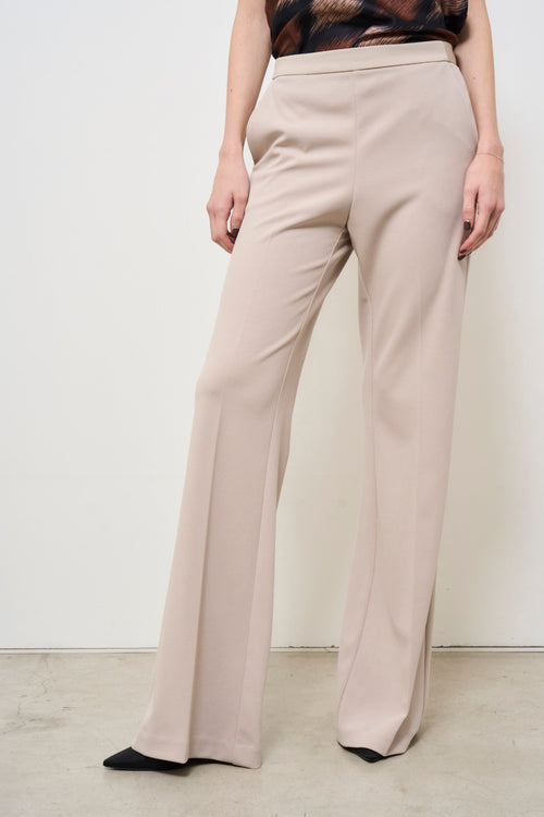 Beige women's flared trousers