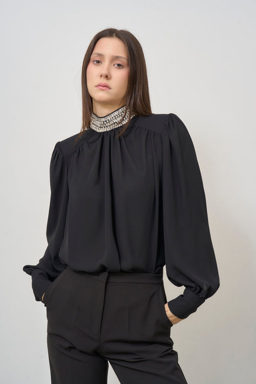 Black women's blouse with high neck and rhinestone detail