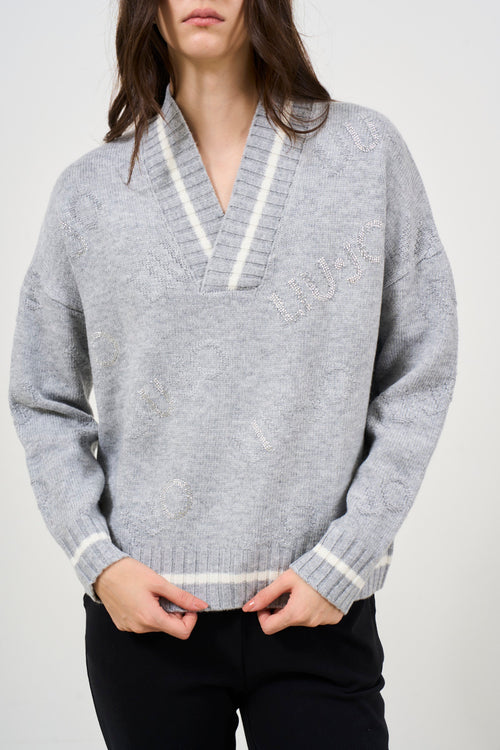 Women's grey V-neck sweater