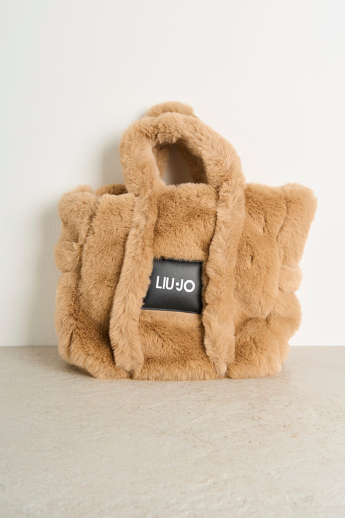 Women's handbag with fur effect