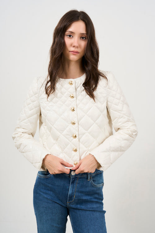 White quilted women's down jacket