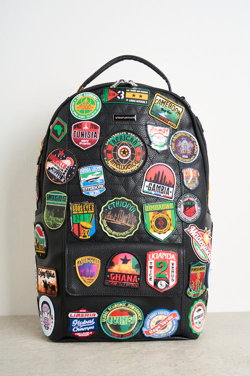 Multi-colored men's backpack with patches