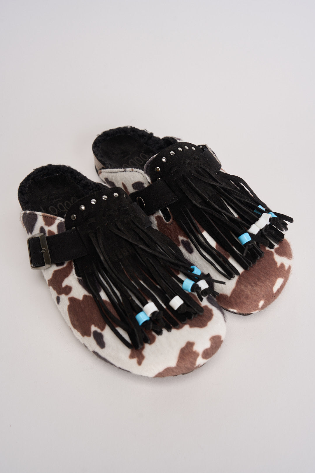 Sabot donna in suede animalier con frange DANDARA COW NERO BIANCO LAGOA 