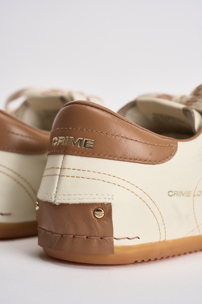 Sneakers donna con ciondolo panna 23603 10 CRIME LONDON 