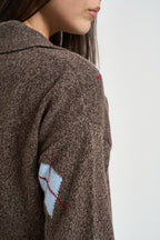 Polo donna in maglia a rombi marrone D82468 MORO MOTEL 