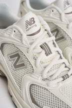 Sneakers donna 530 bianche e tortora U530 CSB NEW BALANCE 