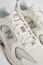 Sneakers uomo 530 bianche e tortora U530. CSB NEW BALANCE 