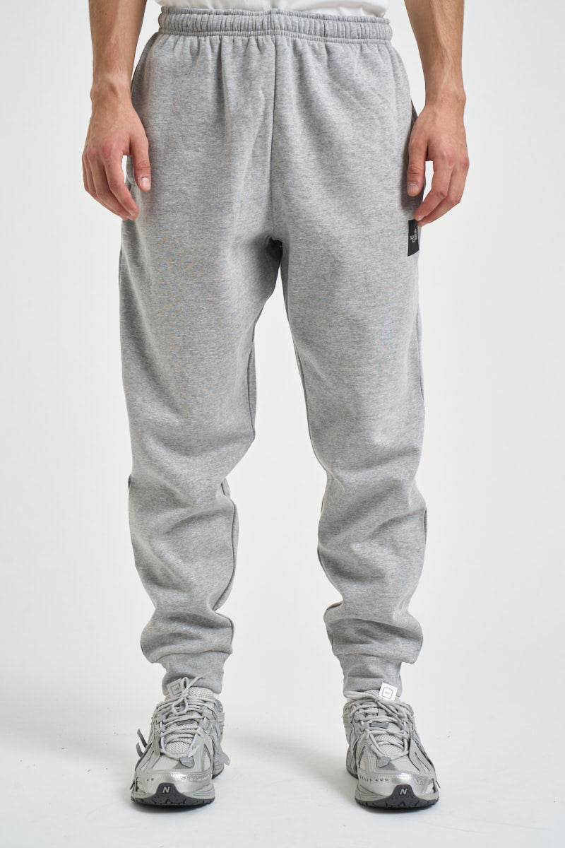 Pantaloni uomo tuta grigio melange 8JB0 CQO THE NORTH FACE 