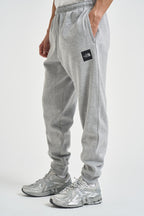 Pantaloni uomo tuta grigio melange 8JB0 CQO THE NORTH FACE 