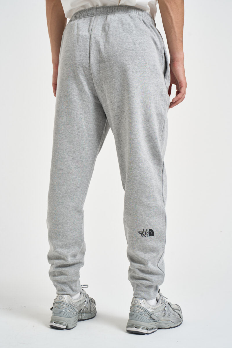 Pantaloni uomo tuta grigio melange 8JB0 CQO THE NORTH FACE 