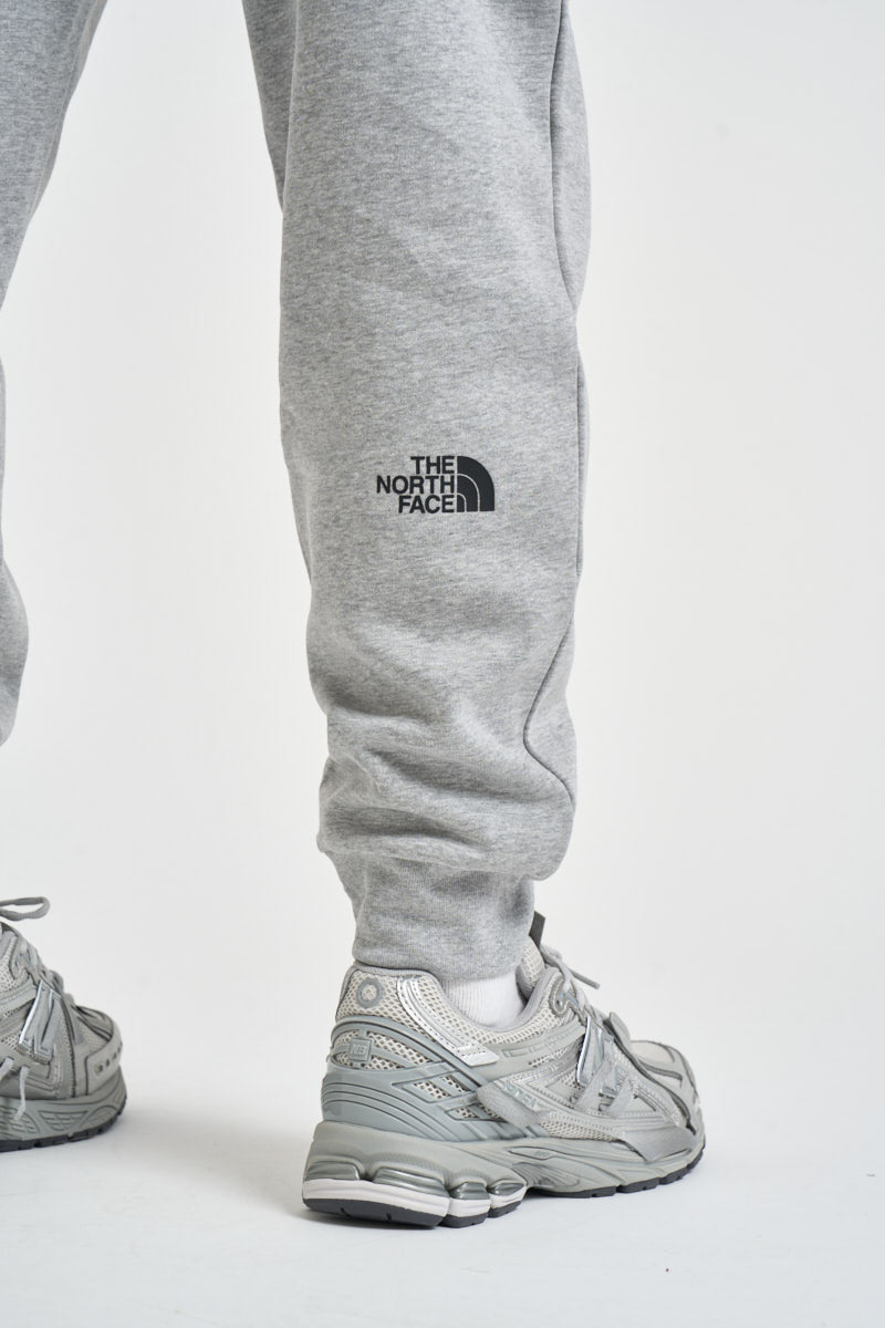 Pantaloni uomo tuta grigio melange 8JB0 CQO THE NORTH FACE 
