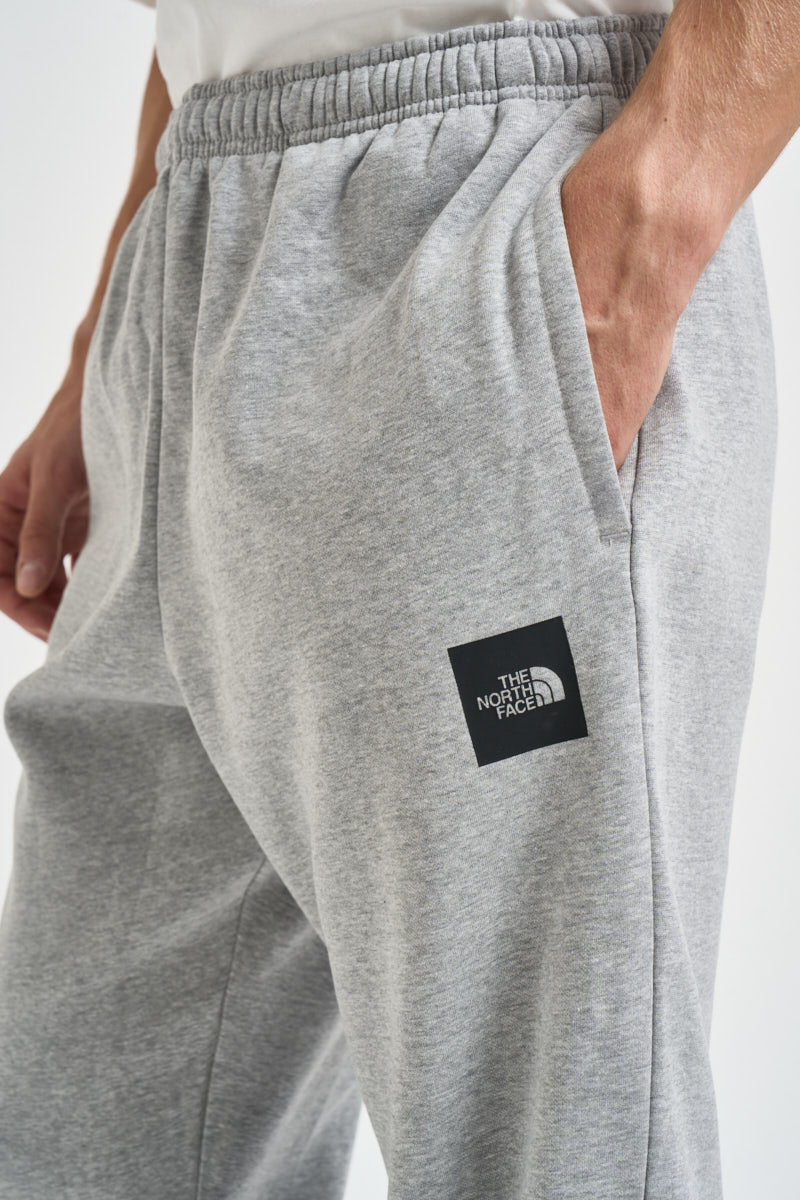 Pantaloni uomo tuta grigio melange 8JB0 CQO THE NORTH FACE 