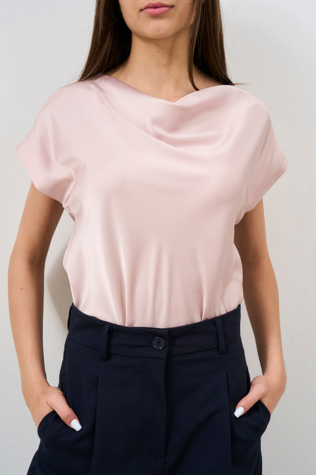 Women's satin top with candy pink drapes
