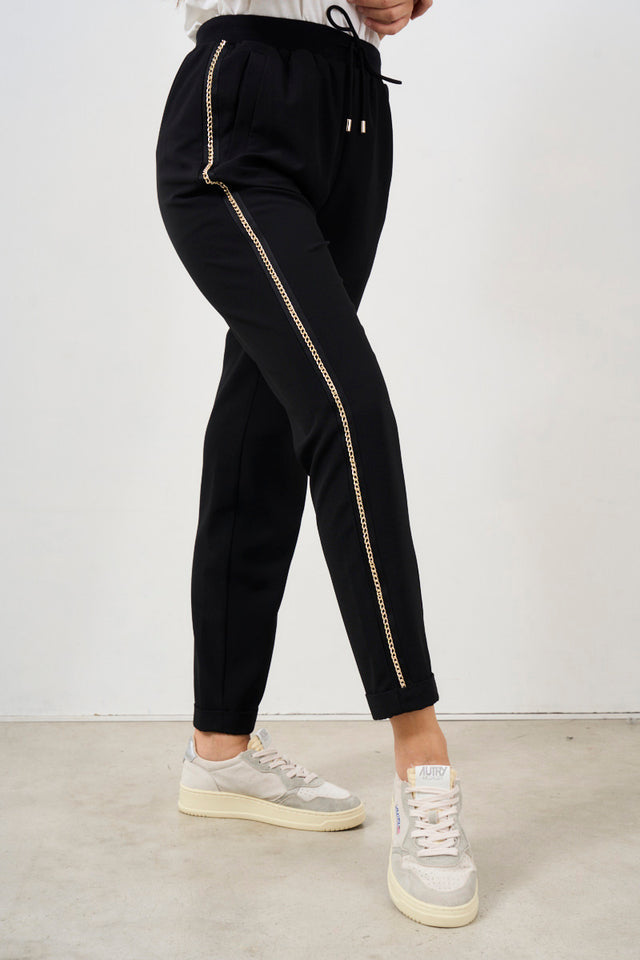 Women's sports trousers with chain detail