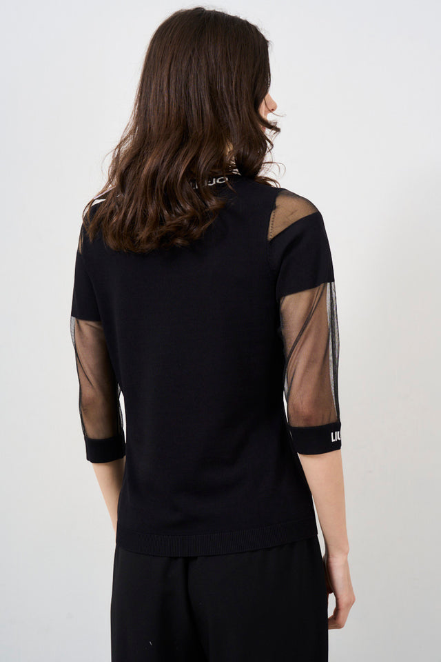 Black women's shirt with mesh sleeves<br><br>