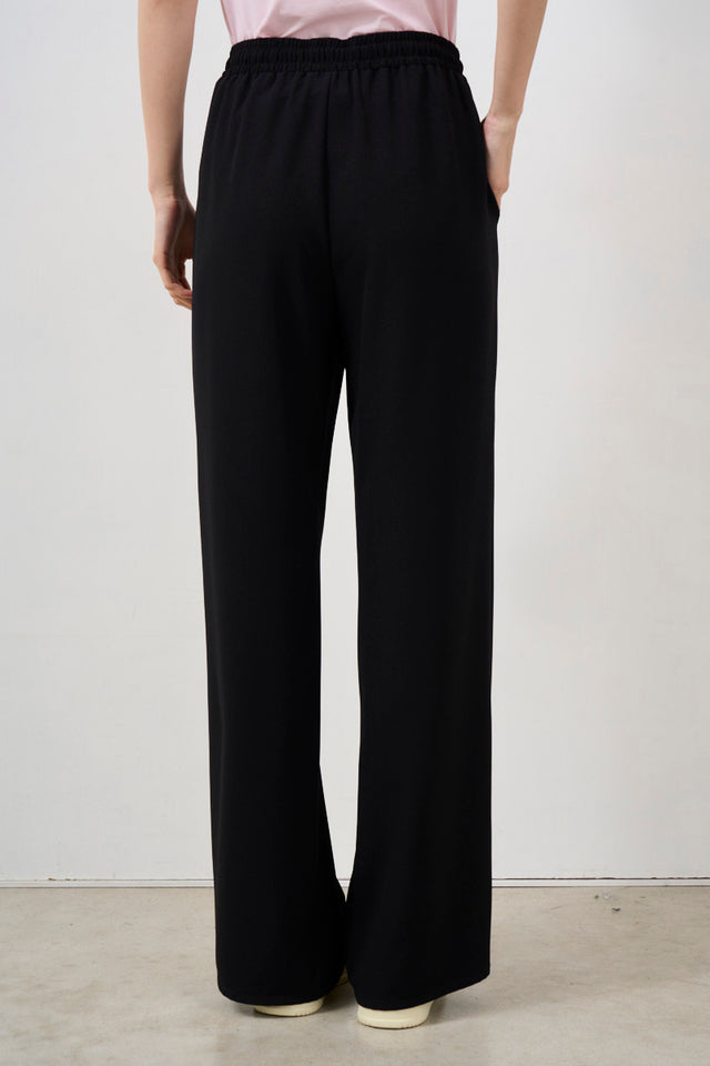 Women's trousers with drawstring and rhinestone detail