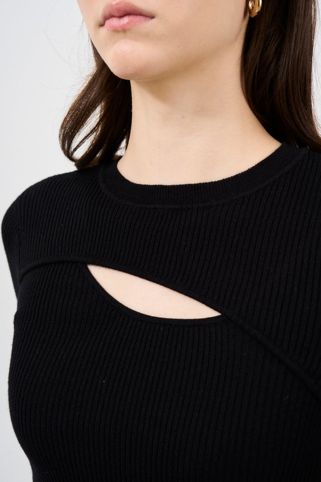 Women's knitted sweater with cut out
