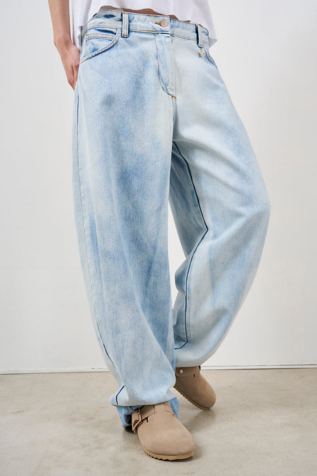Women's jeans in badly dyed denim
