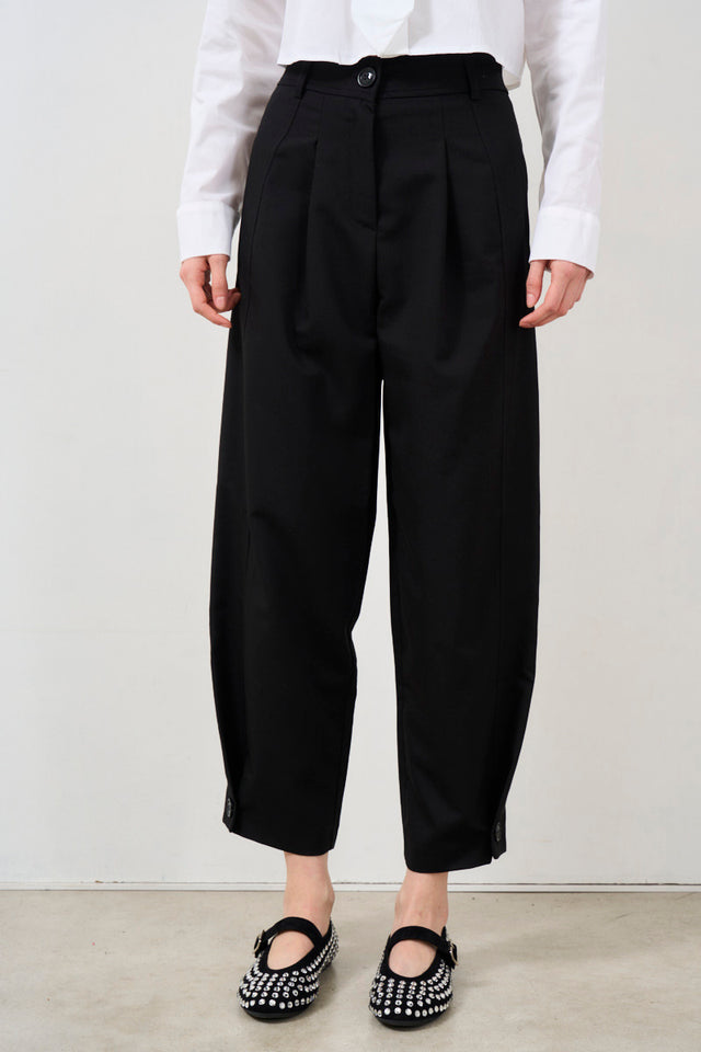 Women's trousers with button on the bottom