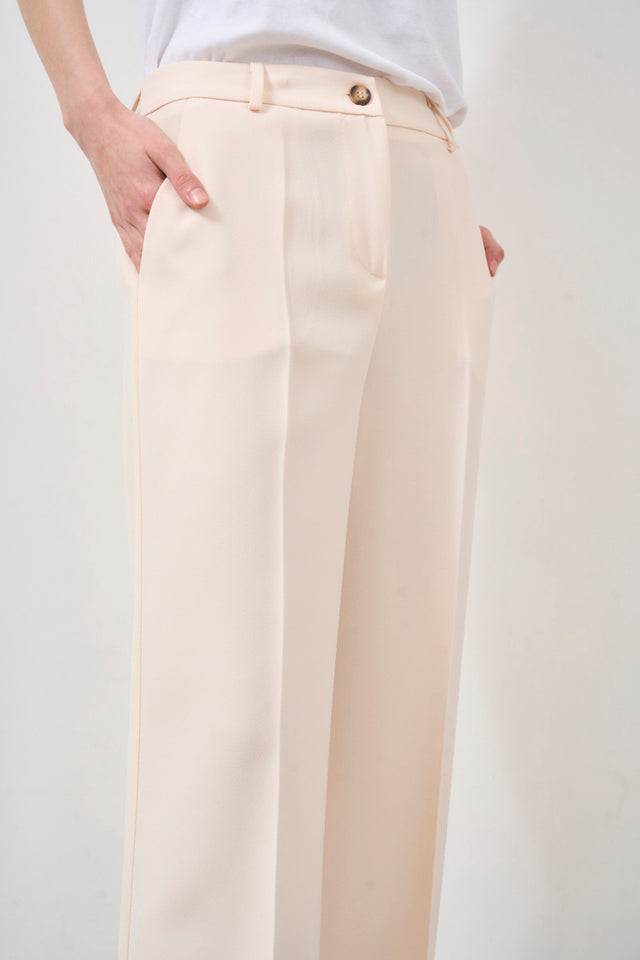 TENSION IN Elegant milk-colored trousers