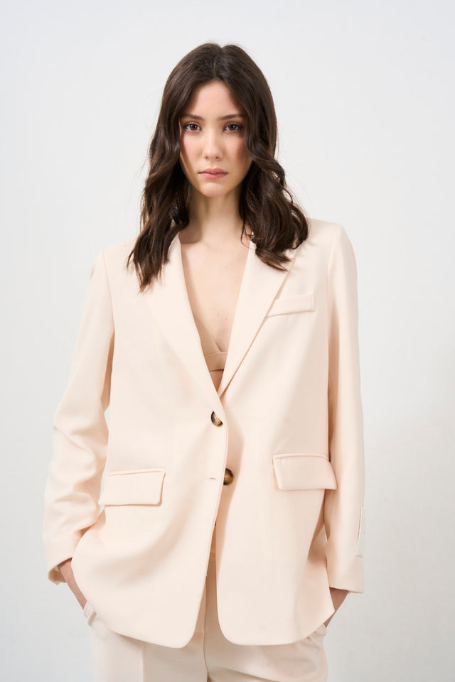 TENSIONE IN elegant milk-colored jacket