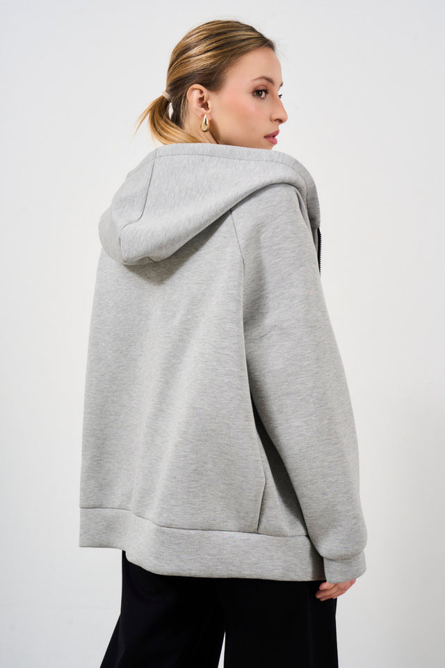 Oversized women's sweatshirt with zip and hood