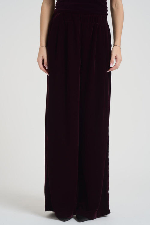 Pantalone donna a palazzo in velluto bordeaux.