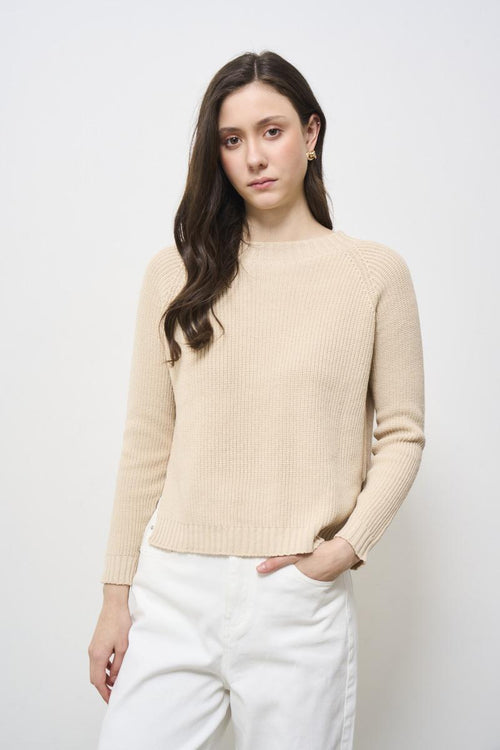 Cream women's sweater with side slits