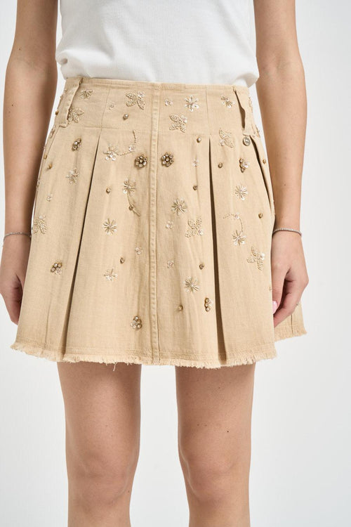 Gonna donna corta con ricami decorativi beige