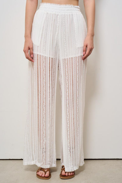 Pantalone donna semitrasparente a righe ricamato bianco