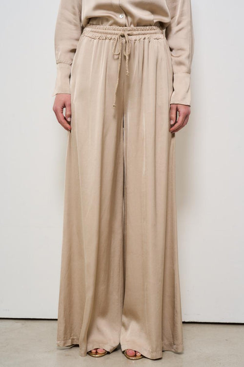 Pantalone donna a palazzo satinato beige - 1