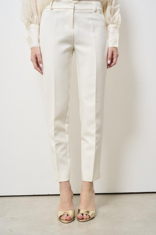 Women's skinny cream trousers