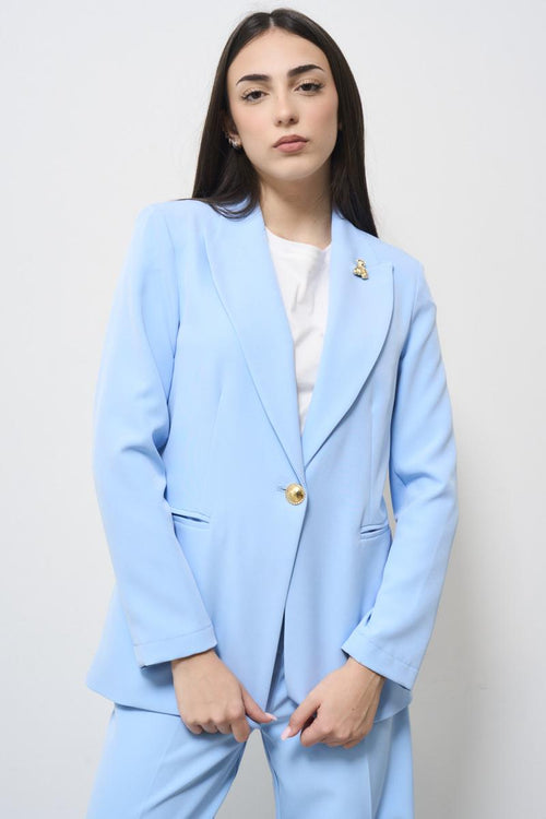 Light blue women's jacket with brooch