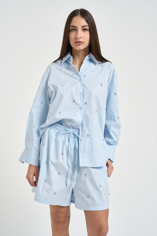 Completo donna con strass celeste