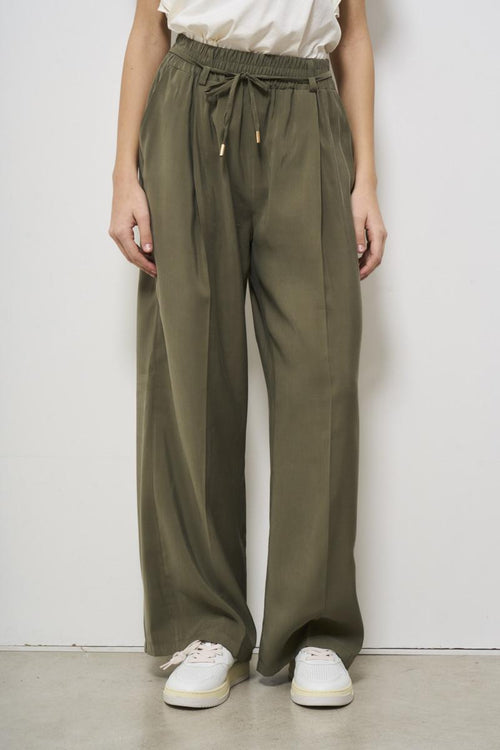 Green women's trousers