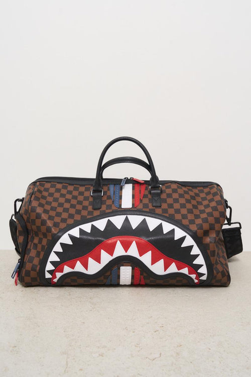 Brown and black checkered men's duffel bag