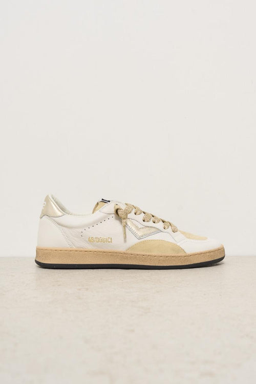 White and gold women's sneakers