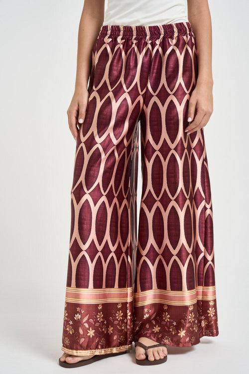 Pantalone donna fantasia geometrica bordeaux