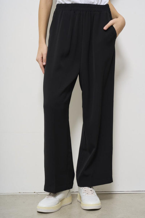 Pantalone donna nero a palazzo - 1